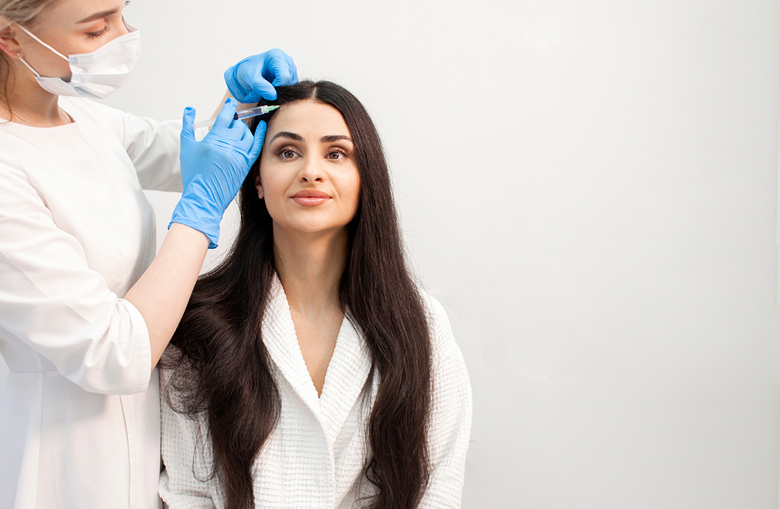 Beautiful woman getting exosomes therapy